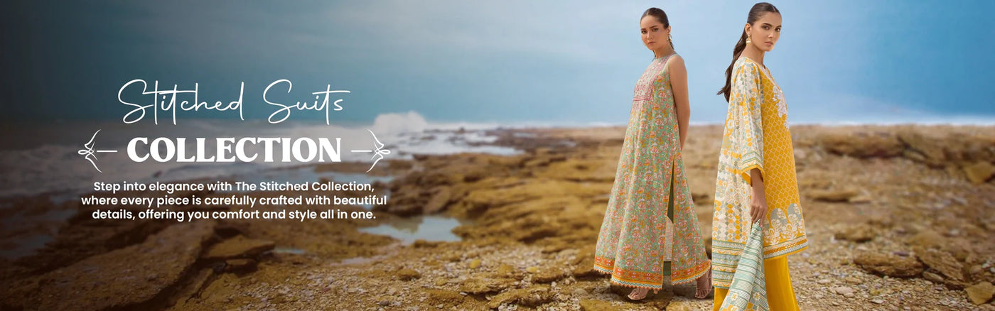 Two women wearing colorful 3pc stitched suits pose on rocky terrain, with text promoting an elegant stitched suits collection in the background.